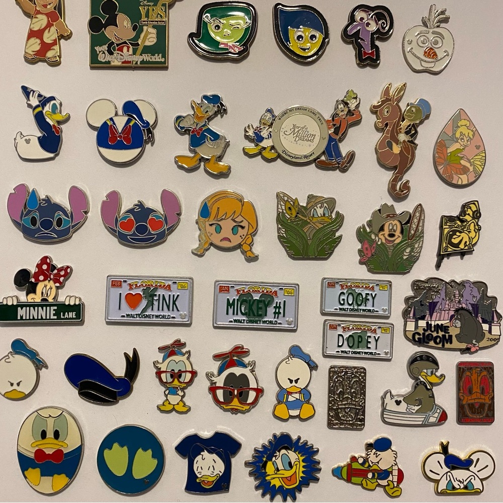 50 DISNEY pins! - will sell individual pins if interested!